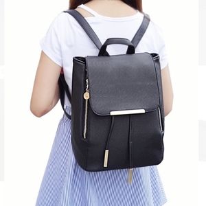 Black faux leather backpack